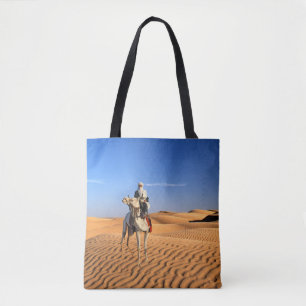 Wüstenmann auf einer Kamel-Tasche Tasche