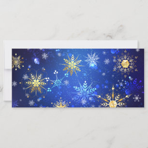 XMAS Blue Background mit goldenen Schneeflocken