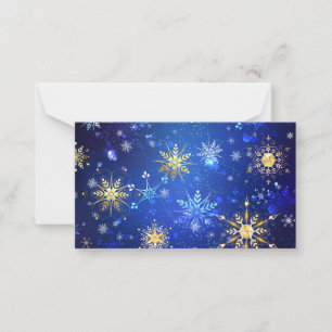 XMAS Blue Background mit goldenen Schneeflocken Mitteilungskarte