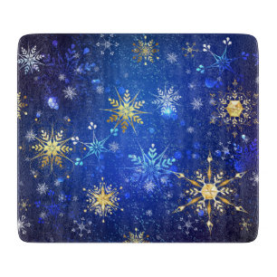 XMAS Blue Background mit goldenen Schneeflocken Schneidebrett