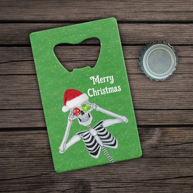 XMas Skelett Weihnachtsmannmütze Ornamente Grün Geldbeutel Flaschenöffner (Smiling Merry Christmas Skeleton Ornament on green card bottle opener.)