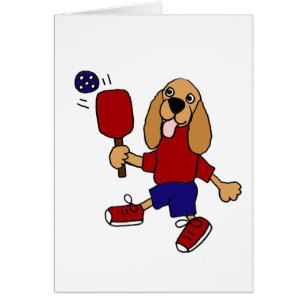XX Cockerspaniel, der Pickleball Cartoon spielt