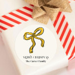 Yellow Gold Watercolor Christmas Bow Sketch Runder Aufkleber<br><div class="desc">Bows überall! Begleiten Sie Ihre Geschenke und hüllen Sie diese Saison mit diesen spielerischen Aufklebern mit einer gelben goldenen Aquarellzeichnung Weihnachtsbogen-Skizze.</div>