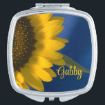 Yellow Sunflower on Blue Wedding Taschenspiegel<br><div class="desc">The pretty Yellow Sunflower on Blue Wedding Compact Mirror makes a great personalized gift idea for the bride to be or her bridesmaids. Personalize it with a name or text of your choice. This elegant custom wedding pocket mirror features a floral photograph of a yellow sunflower blossom with a blue...</div>