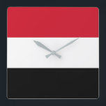 Yemen Flag Quadratische Wanduhr<br><div class="desc">The Yemen flag is a horizontal triband. The used colors in the flag are red,  white,  black. The proportion of the Yemen flag is 2:3. The Flag of Yemen was adopted in 1990. The first use of the current flag design was in 1990.</div>