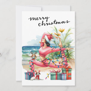 Yoga-Frau mit Geschenk am Strand Weihnachten Thema