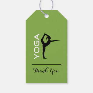 Yoga Pose Silhouette über grünes Hintergrund Viele Geschenkanhänger