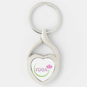 YOGA-Posen mit einem rosa Lotos Schlüsselanhänger