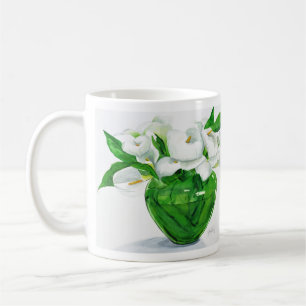 Zantedeschias dans la tasse verte de vase