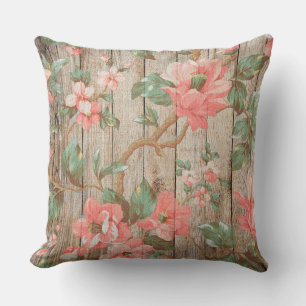 Zarte Vintage-Rosa-Blumen mit grünen Blättern auf  Kissen