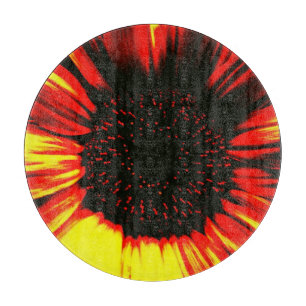 zeitgenössischer Sonnenblumenkernkopf und Blätte Schneidebrett