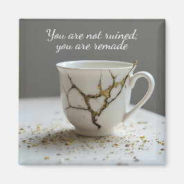 zerbrochene Tasse inspirierender Magnet