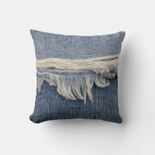 Zerrissene Jeans-Textur, stilvoller Hintergrund. Kissen