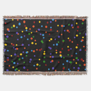 Zerstreutes Regenbogen-Punkte-Muster auf schwarzem Decke