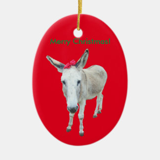 Zieren Sie den Esel mit einem roten Bogen Keramikornament