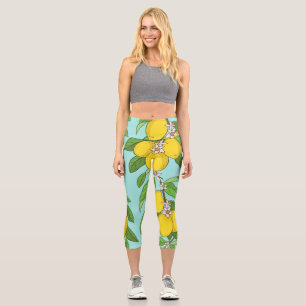 Zitronen, lebendiger blauer Hintergrund nahtlos. Capri Leggings