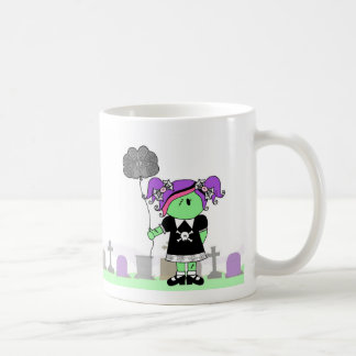 Zombie-Mädchen mit Gehirn-Ballon in der Kaffeetasse