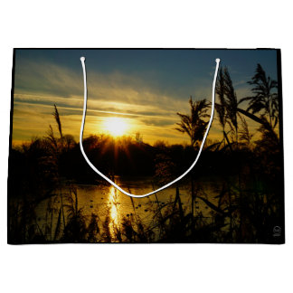 Zonsondergang bij een meertje met rietpluimen. große geschenktüte