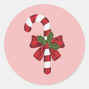 Zuckerstange mit Schleife und Weihnachtsholly auf Runder Aufkleber