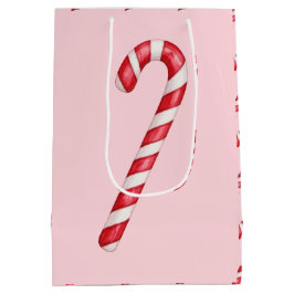 Zuckerstange rot weiß gestreift auf rosa Wasserfar Mittlere Geschenktüte