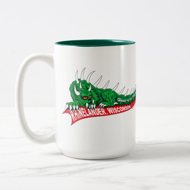 Zuhause des Hodag Rhinelander Wisconsin Zweifarbige Tasse (Links)
