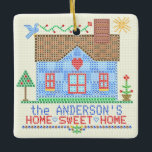 Zuhause-süßes Zuhause-Kreuz-Stich-Haus Keramikornament<br><div class="desc">Dieser personalisierte Landhausentwurf wird gemacht, um einem Vintagen Querstichstickereiprobenehmer zu ähneln. Er zeigt ein blaues Haus, das von "x " s mit einem Vogel, der Sonne und viel der Herzen und der Blumen in der gleichen Art gemacht wird. Der Hintergrund ist mit einem geringfügigen Karomuster beige, wie Stickereimaterial auszusehen. Um...</div>