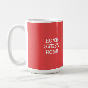 Zuhause-Zuhause-Text in orangefarbenem Rosa Kaffeetasse