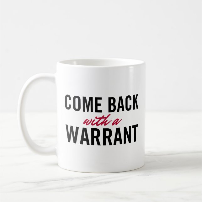 Zurückgekommen mit einer Ermächtigung Kaffeetasse (Links)