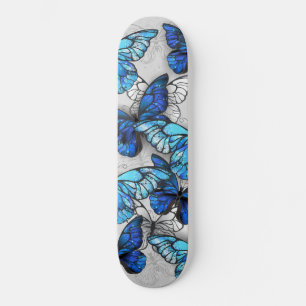 Zusammensetzung der weißen und blauen Schmetterlin Skateboard
