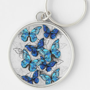 Zusammensetzung von White und Blue Butterflies Schlüsselanhänger