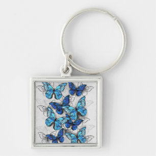 Zusammensetzung von White und Blue Butterflies Schlüsselanhänger