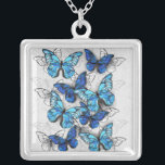 Zusammensetzung von White und Blue Butterflies Versilberte Kette<br><div class="desc">Vertikale Zusammensetzung von Realität,  Blue and White Morpho Butterflies on gray textured background. Morpho blue butterfly.</div>