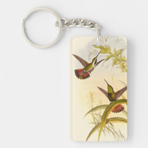 Zwei bunte Kolibris, die die gleiche Blume Schlüsselanhänger