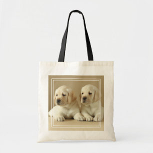 Zwei Golden Labrador Welpen Tragetasche