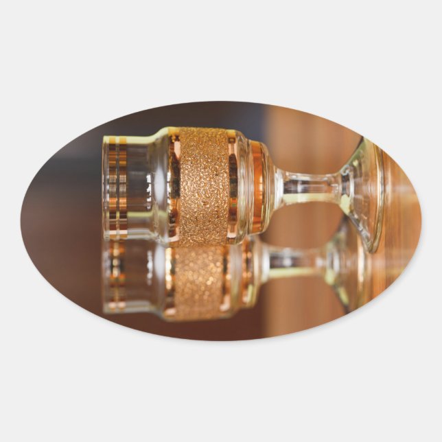 Zwei goldene Brillen Ovaler Aufkleber (Vorderseite)