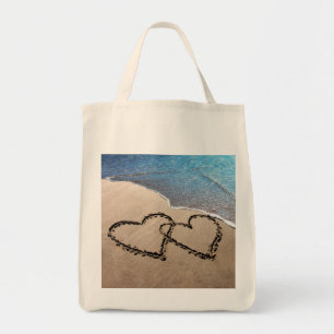 Zwei Herzen in der sandischen Tasche