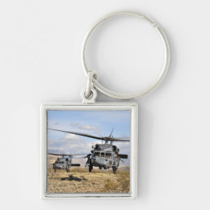 Zwei HH-60 Pavehawk Hubschrauber, die zu lan sich Schlüsselanhänger