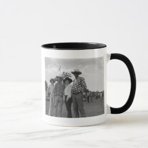 Zwei Männer und zwei Frauen bei einem Rodeo Tasse