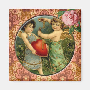Zwei niedliche Amor-Vintager viktorianischer Magnet
