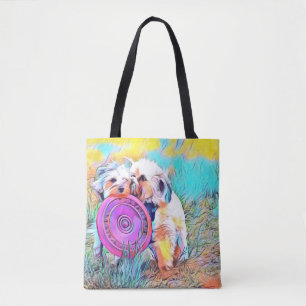 Zwei niedliche Hunde, die Frisbee-Tasche spielen Tasche