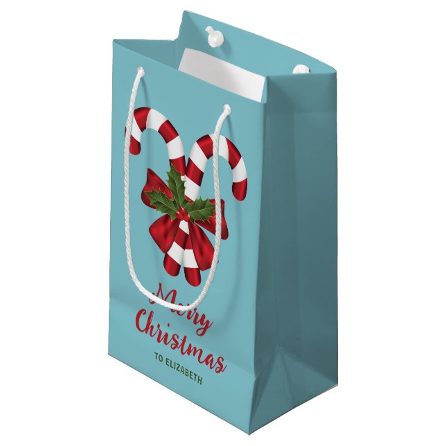 Zwei rote und weiße, festliche Süßspeisen mit Text Kleine Geschenktüte (Vorderseite Schrägansicht)