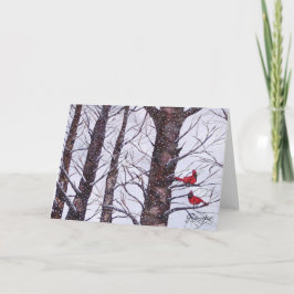 Zwei rote Vögel im Winter Feiertagskarte