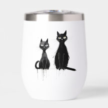 Zwei schwarze Katzen