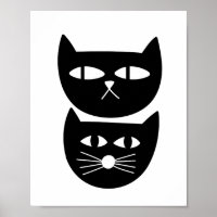 Zwei schwarze Katzen