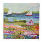 Zwei Segelboote und Hütte Fliese<br><div class="desc">Zwei Segelboote und Hütte I von Karen Fields. Helle,  lustige Szene mit Blume,  Bäumen,  einer Hütte und Segelbooten auf dem Wasser.</div>