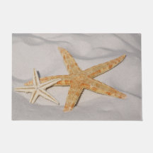 Zwei Starfish im Sand groß