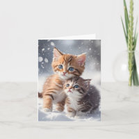 Zwei Tabby-Kätzchen spielen in Snow Blank Gruß