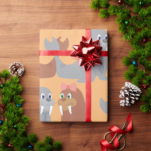 Zwei Walrosse wickeln Geschenkpapier