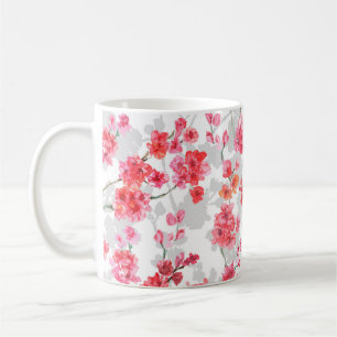 Zweige von Kirschblüten auf weißem und grauem Hint Kaffeetasse